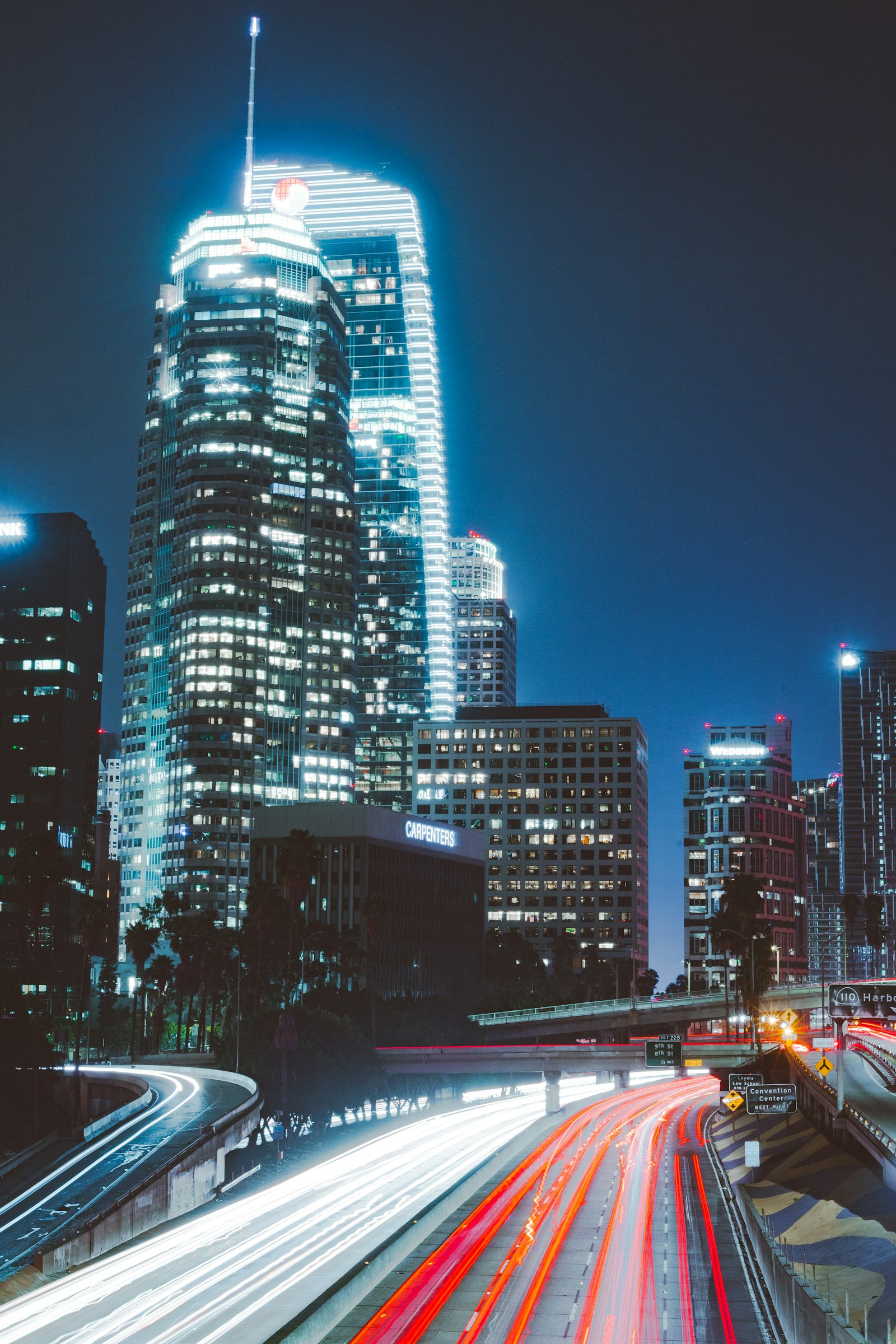 City lights streaking past at night