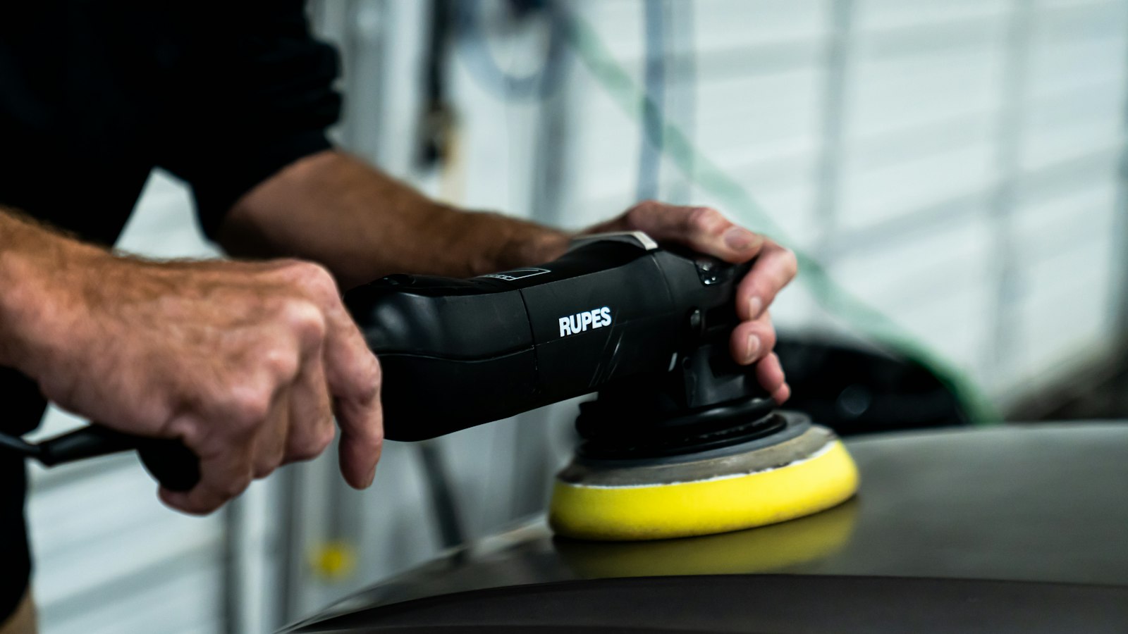 A precision polisher restoring the finish